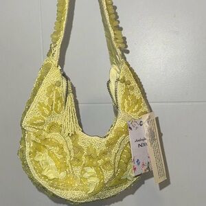 Vibrant Yellow Shoulder Bag with Shimmery Finish